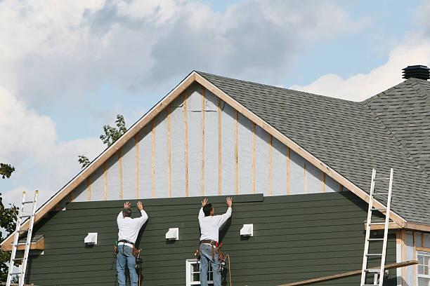 Professional Storm Damage Siding Repair technician working in Bradfordwoods, PA